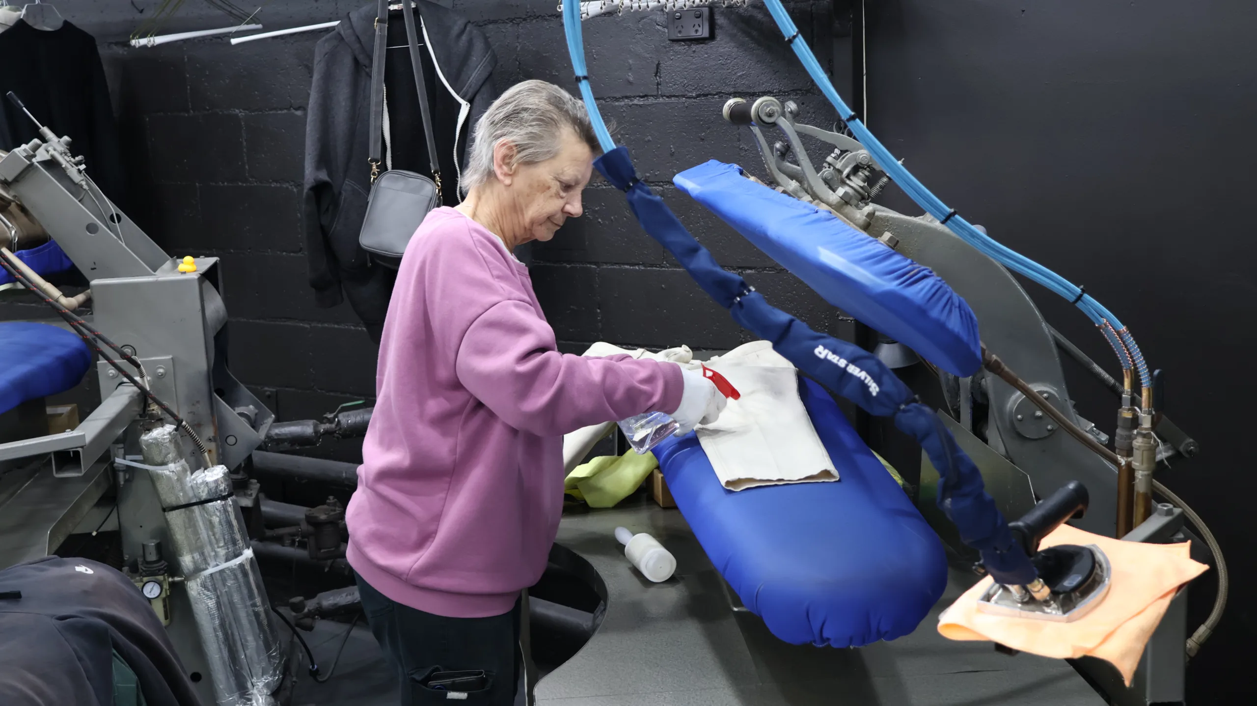 Dry Cleaners Staff Ironing and pressing machine